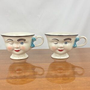 Baileys anthropomorphic yum face mugs pair